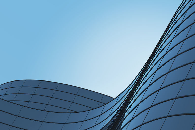 Curve glass building and dark steel window 